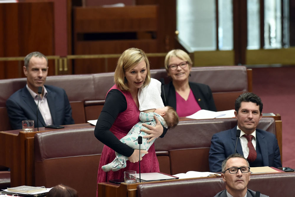 Larissa Waters breastfeeds her baby Alia Joy in the Senate Chamber, 22 June 2017. In 2003 and 2016 the Senate amended its standing orders to allow senators to breastfeed or briefly care for infants in the Senate chamber. DPS Auspic.