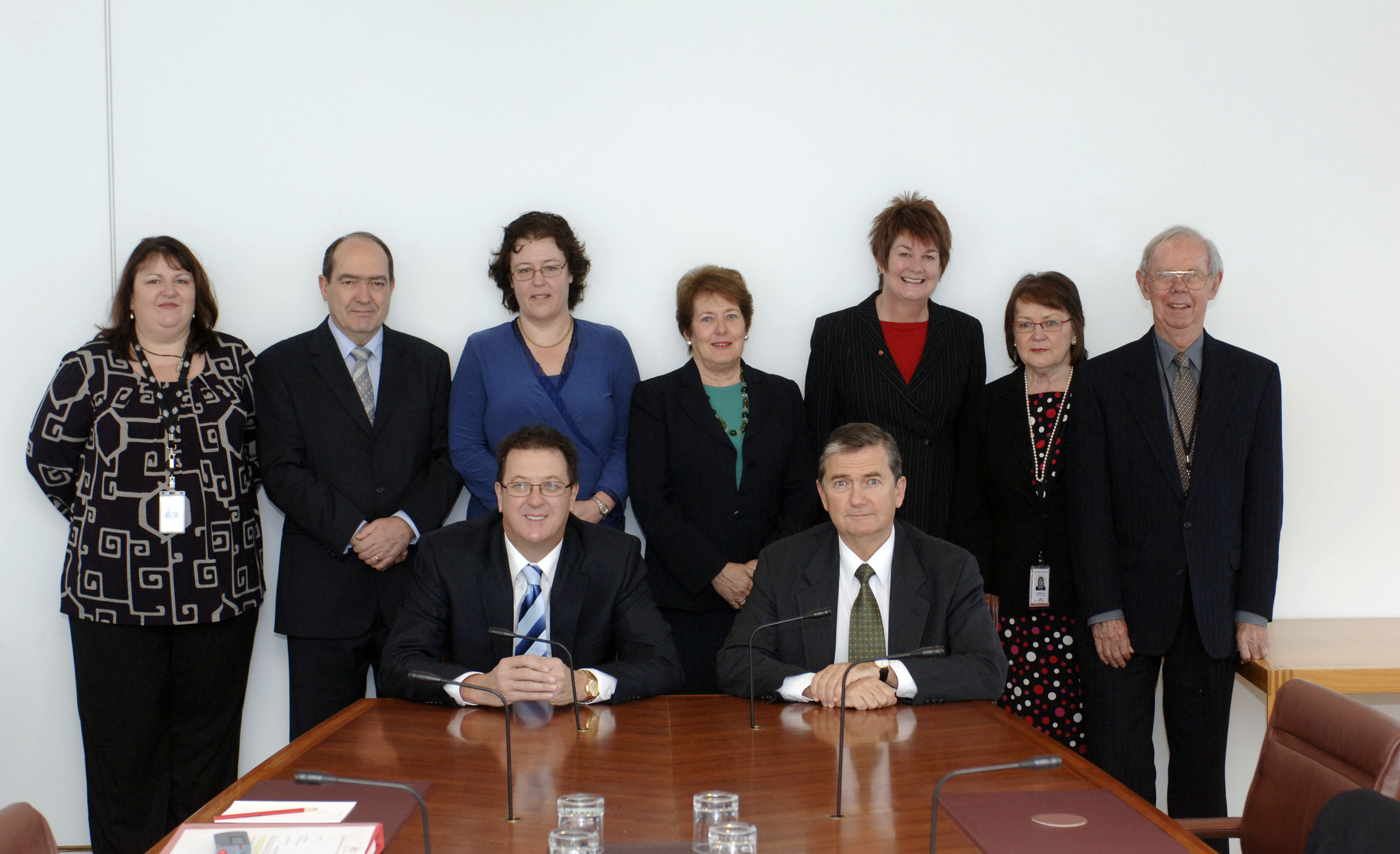 Senate Scrutiny of Bills Committee, 25 June 2008. Seated L-R: Senators Mark Bishop [Deputy Chair] and Christopher Ellison [Chair]. Standing L-R:  Cheryl Wilson [Committee Secretary], Senators  Andrew Murray, Jacinta Collins,  Judith Troeth and Anne McEwen, Margaret Lindeman [committee staff], Professor Jim Davis [Legal Adviser]. 