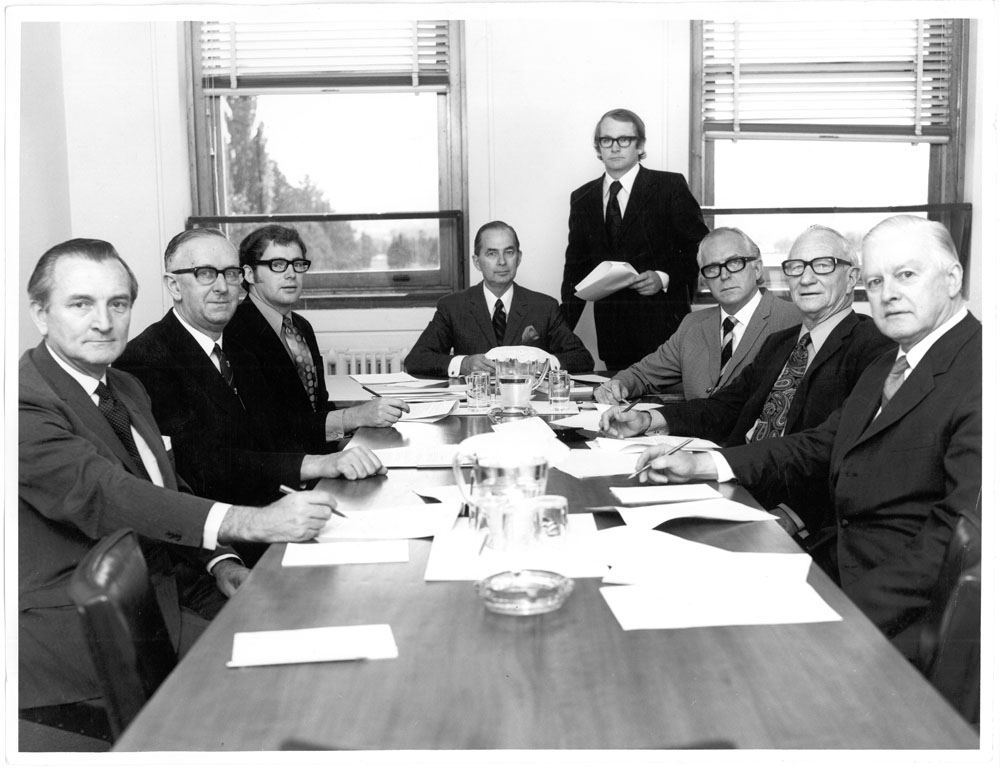 The Standing Committee on Education, Science and the Arts, 1972. Standing: Boris Andrusiak [Research Officer]. Seated L-R: Senators John Carrick, Frank McManus, Dr Colin Campbell [Secretary], Senators Gordon Sinclair [Chair], Jim McClelland, Bertie Milliner and George Hannan.