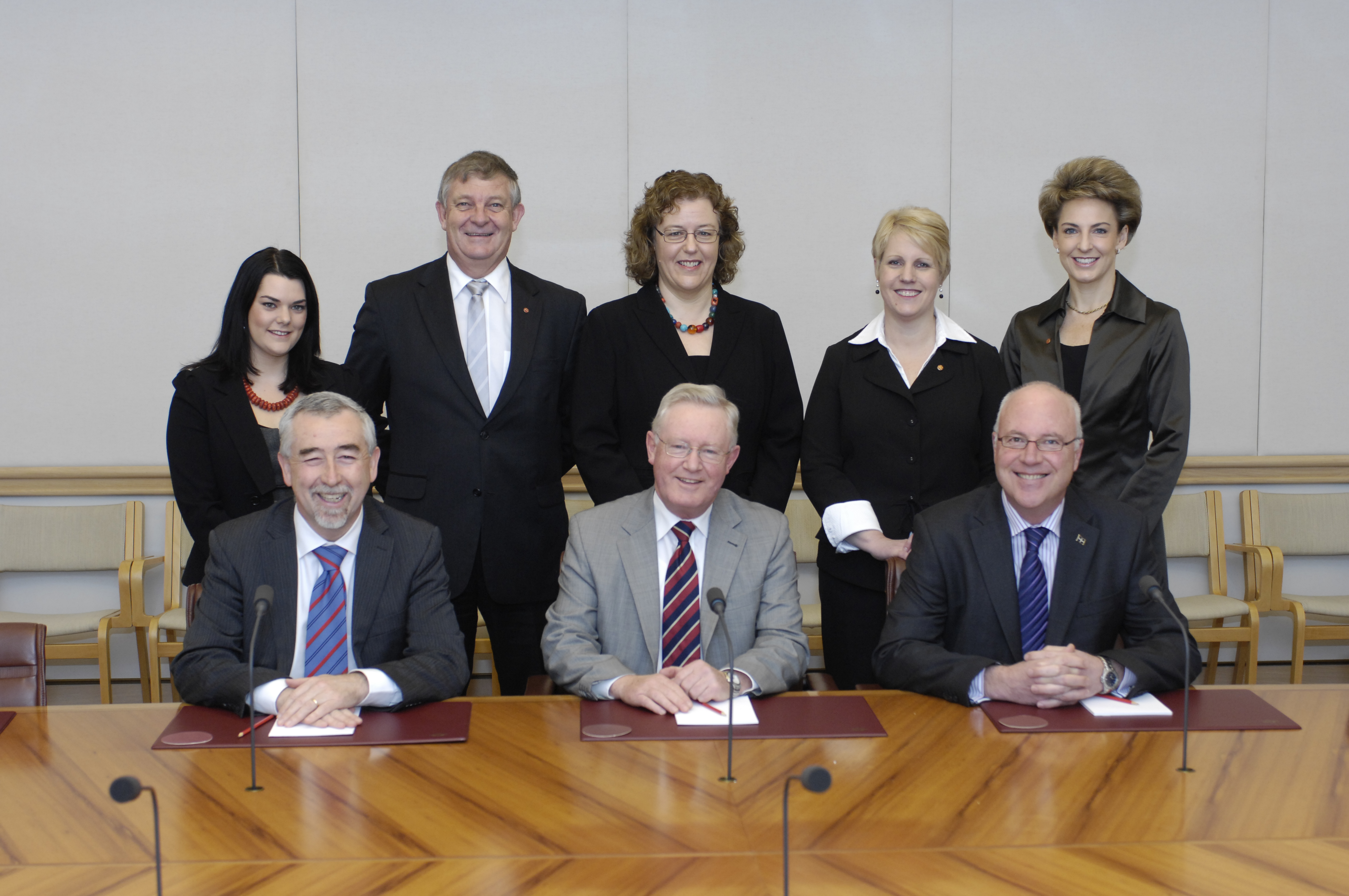 Standing Committees on Education, Employment and Workplace Relations (Legislation and References), 14 September 2009. Standing L-R: Senators Sarah Hanson-Young, Chris Back, Jacinta Collins, Catryna Bilyk and Michaelia Cash. Seated L-R: Senator Gary Humphries [Chair, References], John Carter [Secretary] and Senator Gavin Marshall [Deputy Chair, References]. DPS Auspic.