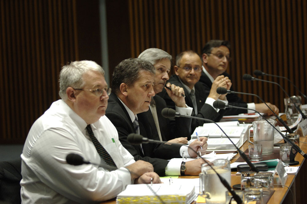 Senator the Hon Chris Evans, Minister for Immigration and Citizenship, answering questions alongside officers from the Department of Immigration and Citizenship at the supplementary budget estimates hearing, 21 October 2008. L-R: Andrew Metcalfe [Departmental Secretary], Senator Chris Evans [Minister for Immigration and Citizenship], Peter Hughes [Deputy Secretary], Peter Vardos [First Assistant Secretary, Migration and Visa Policy Division] and Kruno Kukoc [Principal Adviser, Migration Strategies Branch]. DPS Auspic. 