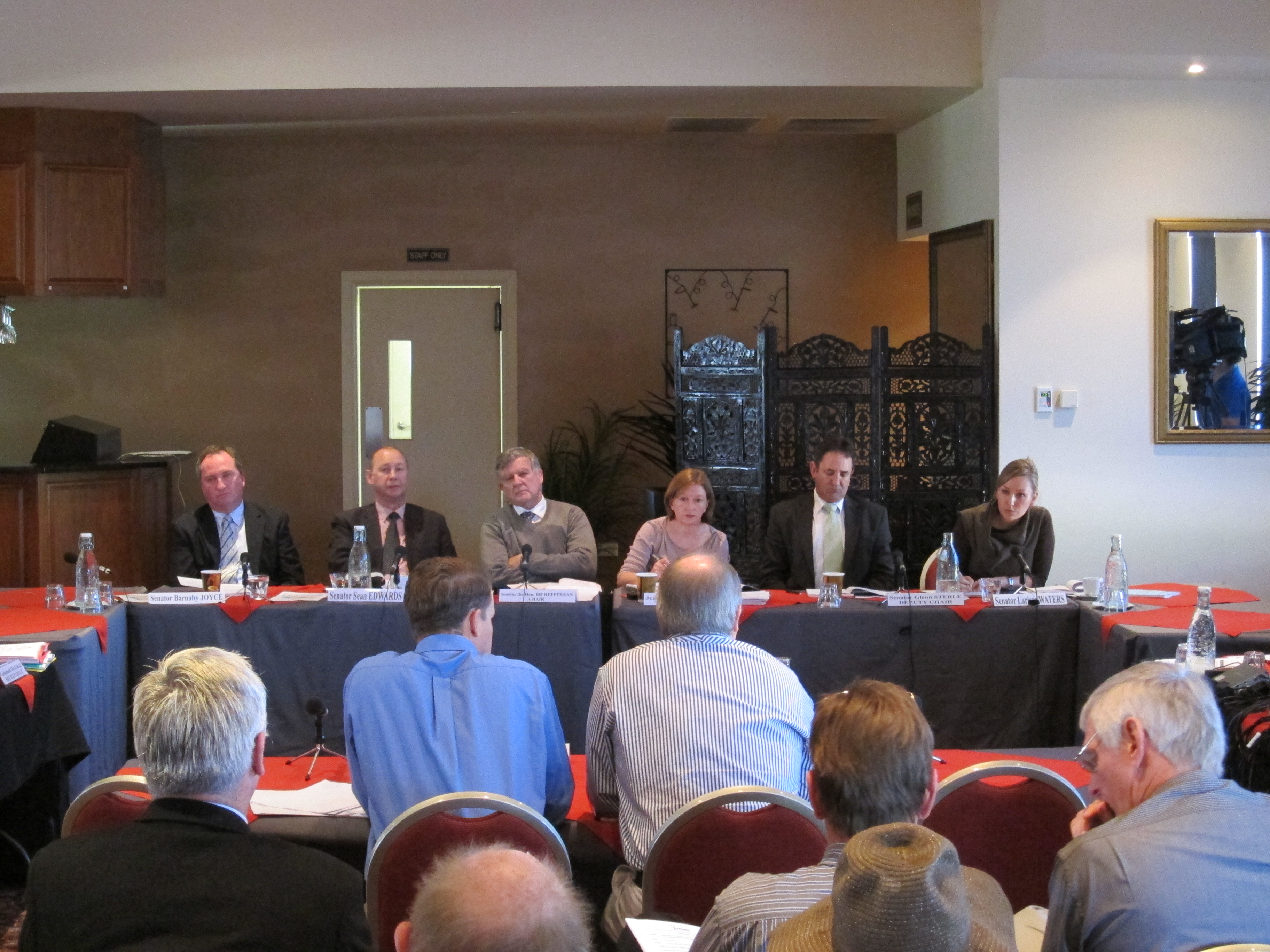 \x3cp\x3eHearing at Roma, Qld, 18 July 2011. Facing camera L-R: Senators Barnaby Joyce, Sean Edwards and Bill Heffernan [Chair], Jeanette Radcliffe [Committee Secretary], Senators Glenn Sterle and Larissa Waters. \x3c/p\x3e