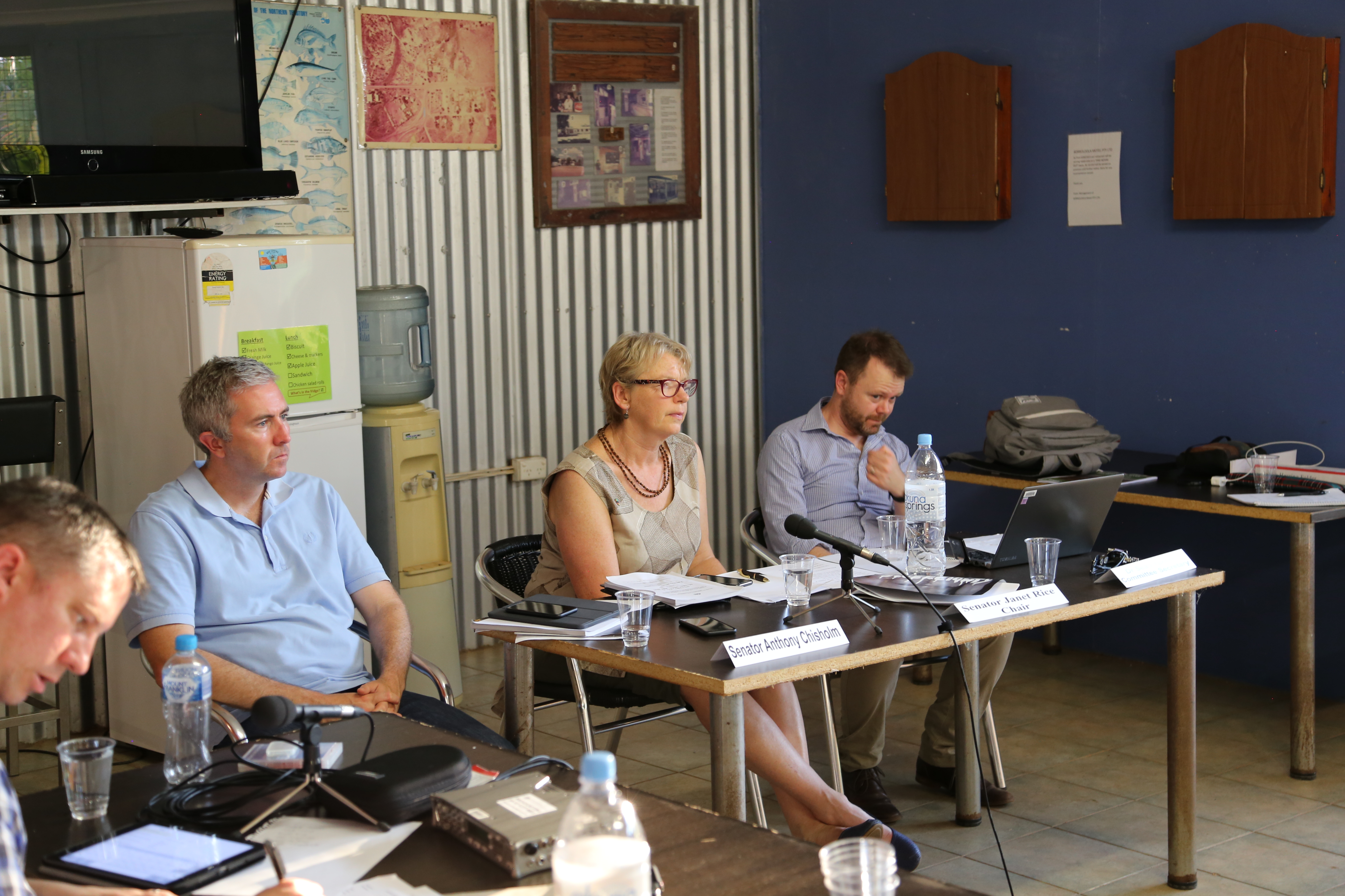 \x3cp\x3eSenators Anthony Chisholm and Janet Rice and committee secretary Dr Sean Turner at the Environment and Communications References Committee hearing at Borroloola, NT, 31 October 2017. When broadcasting equipment stopped working the hearing had to be recorded using smartphones placed strategically around the room.\x3c/p\x3e