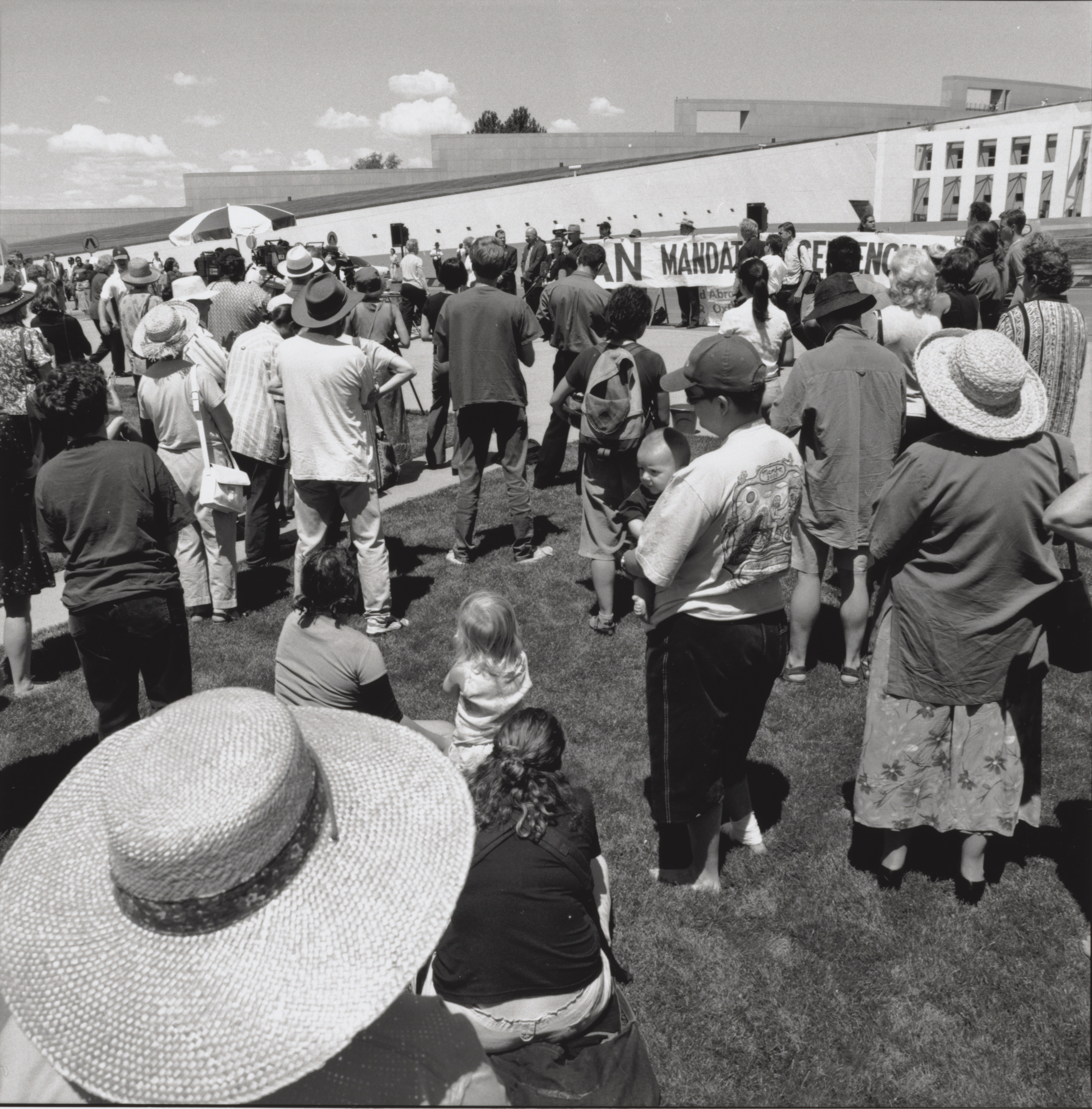 \x3cp\x3eLoui Seselja, Photograph of a protest rally against Northern Territory and Western Australian mandatory sentencing laws held on the final day of the Senate Legal and Constitutional References Committee inquiry into mandatory sentencing, 17 February 2000, at Parliament House, Canberra. National Library of Australia, PIC NL38400/23A/7.\x3c/p\x3e