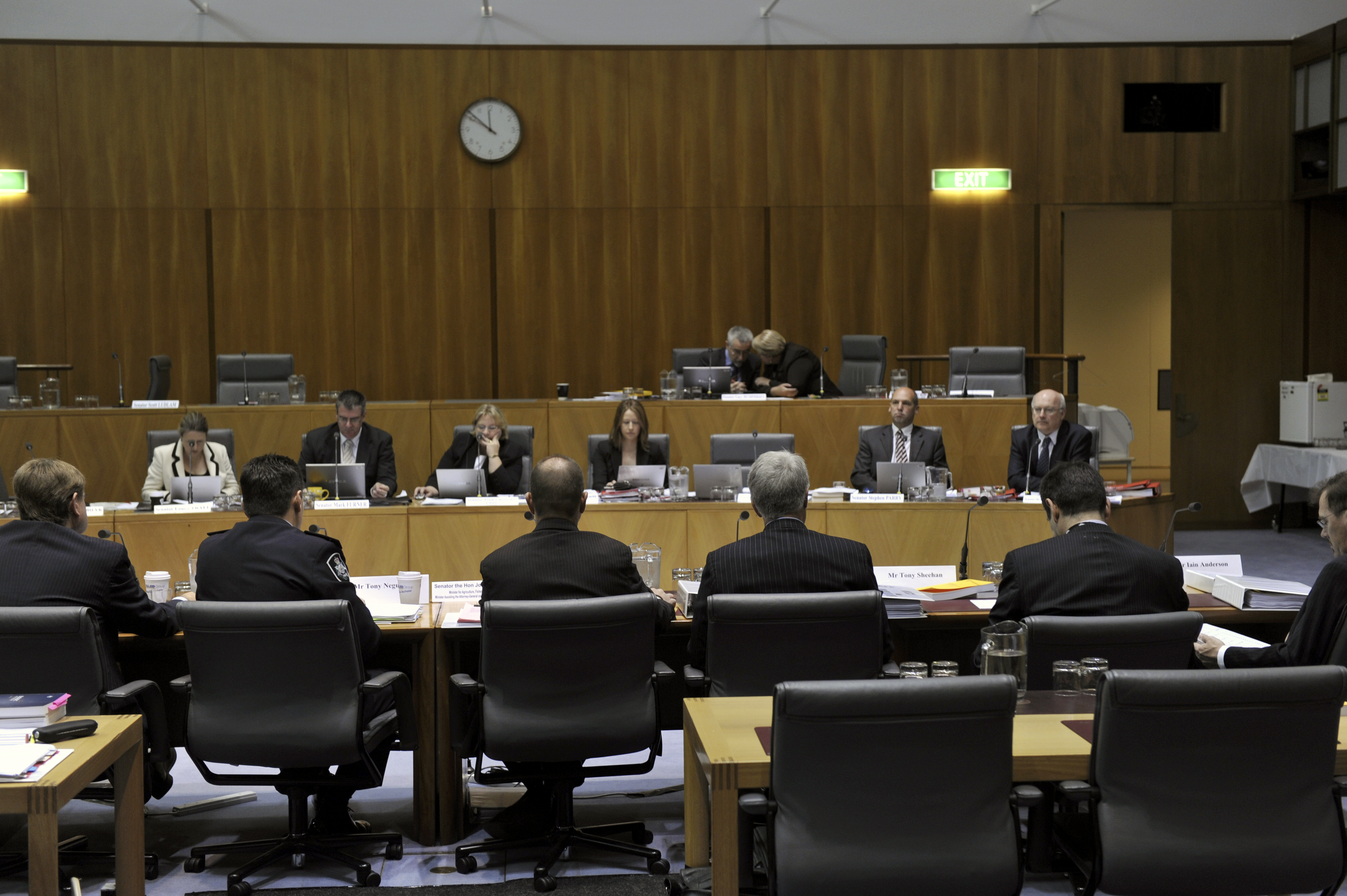 \x3cp\x3eSenator the Hon Joe Ludwig, Minister Assisting the Attorney-General on Queensland Floods Recovery, and officers from the Australian Federal Police and the Attorney-General\'s Department attending the 26 May 2011 hearing. Top row L-R: Senators Gary Humphries and Sue Boyce. Seated in bottom row facing camera L-R: Senators Louise Pratt, Mark Furner, Trish Crossin [Chair], Julie Dennett [Secretary], Senators Stephen Parry and George Brandis. DPS Auspic.\x3c/p\x3e