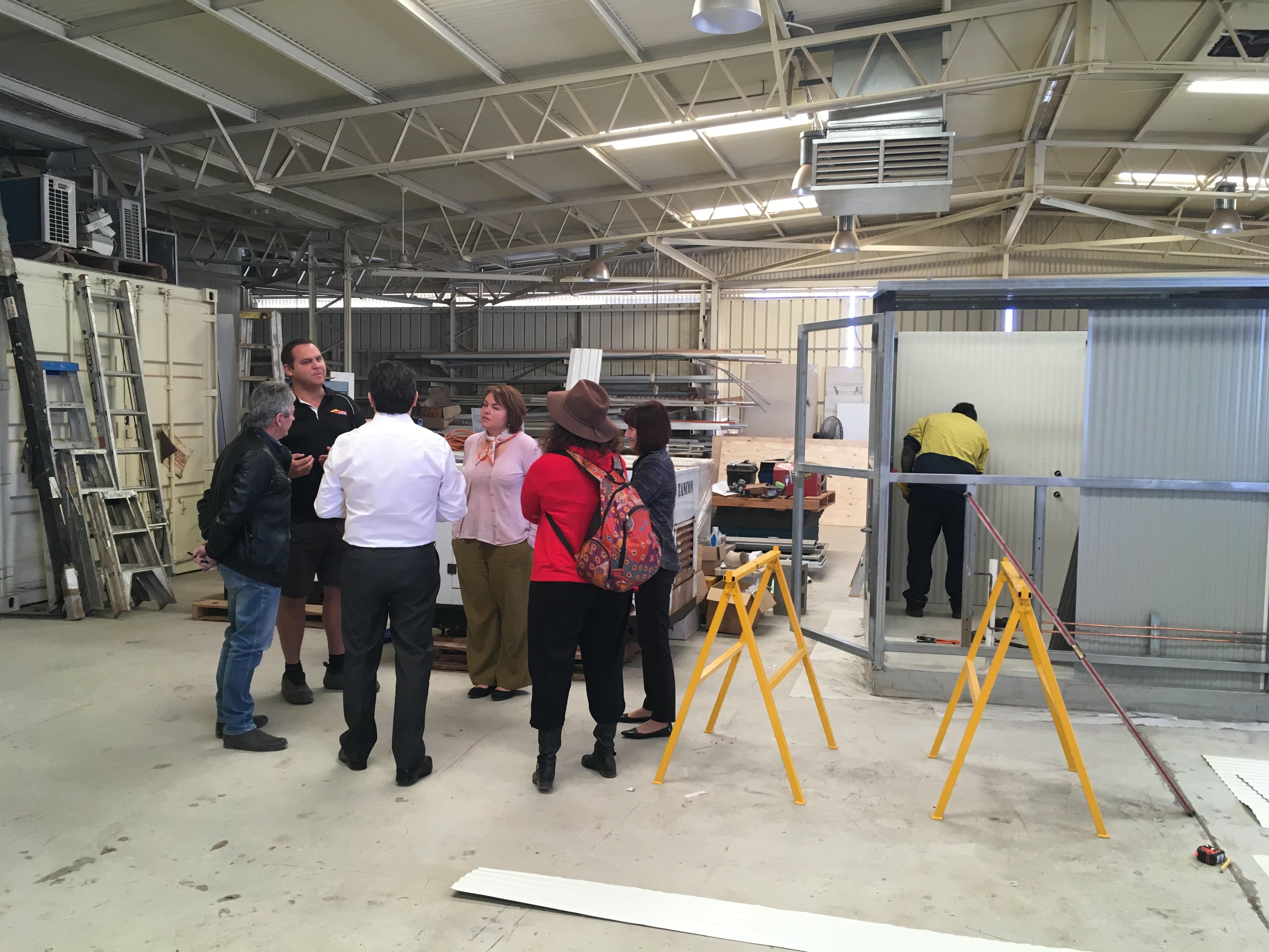 \x3cp\x3eCommittee members touring the workshop at Tangentyere Constructions at Alice Springs during a site visit on 28 August 2017. \x3c/p\x3e