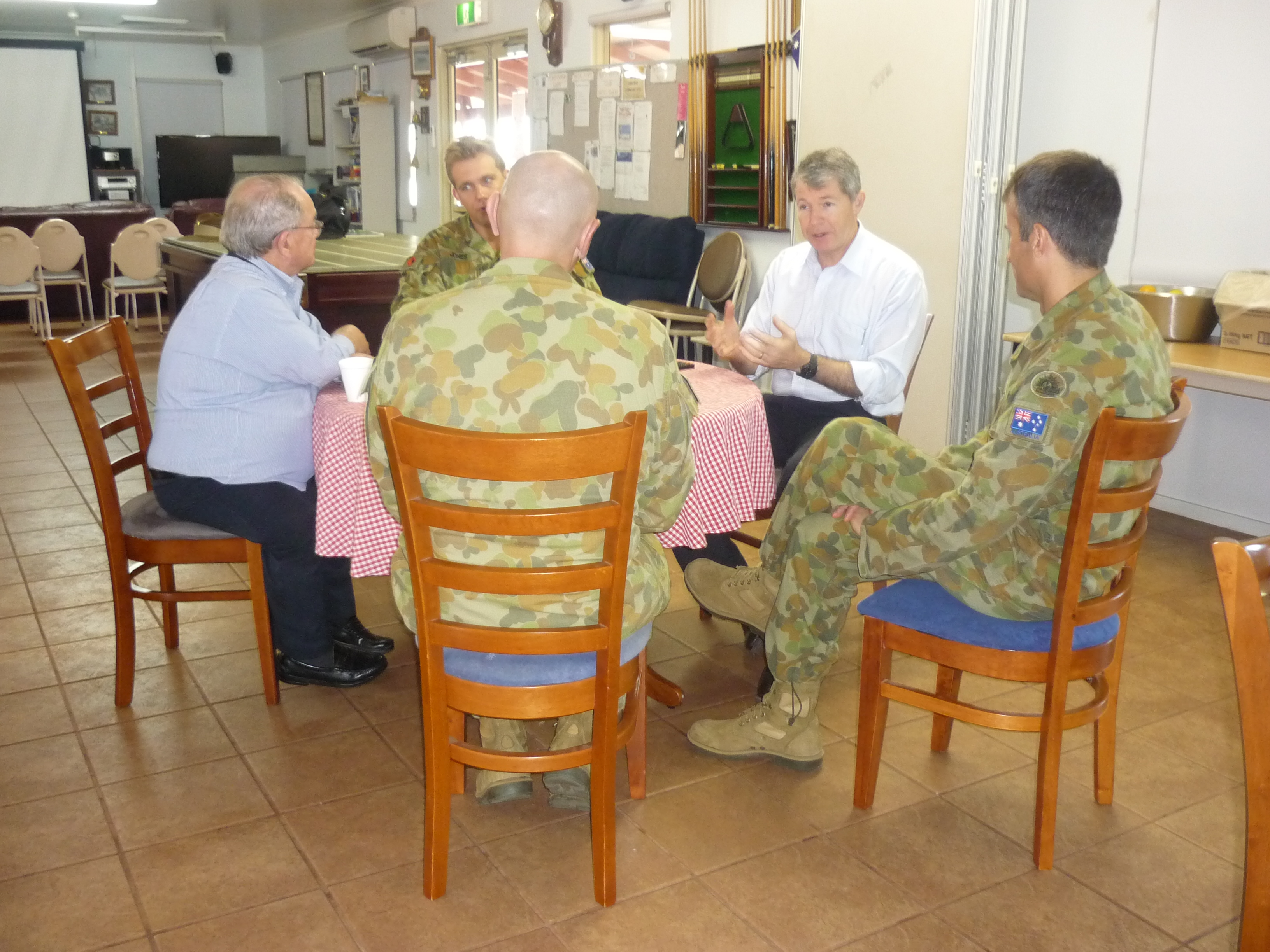 \x3cp\x3eCommittee members Senator Alan Eggleston [Chair] (left) and Senator David Fawcett (second from right) speaking with officers from the Pilbara Regiment in Karratha, WA, 23 April 2013.\x3c/p\x3e