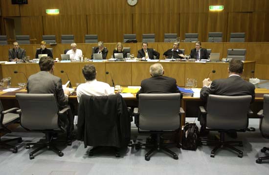 \x3cp\x3eForeign Affairs, Defence and Trade Legislation Committee questioning Senator the Hon Robert Hill, representing the Minister for Foreign Affairs and the Minister for Trade, and officers from the Department of Foreign Affairs and Trade at a budget estimates hearing, 2 June 2004. Seated facing camera L-R: Senators Bob Brown, Marise Payne, Alan Ferguson and Sandy Macdonald, Saxon Patience [Acting Secretary], Senators Chris Evans, Robert Ray and John Faulkner. DPS Auspic.\x3c/p\x3e
