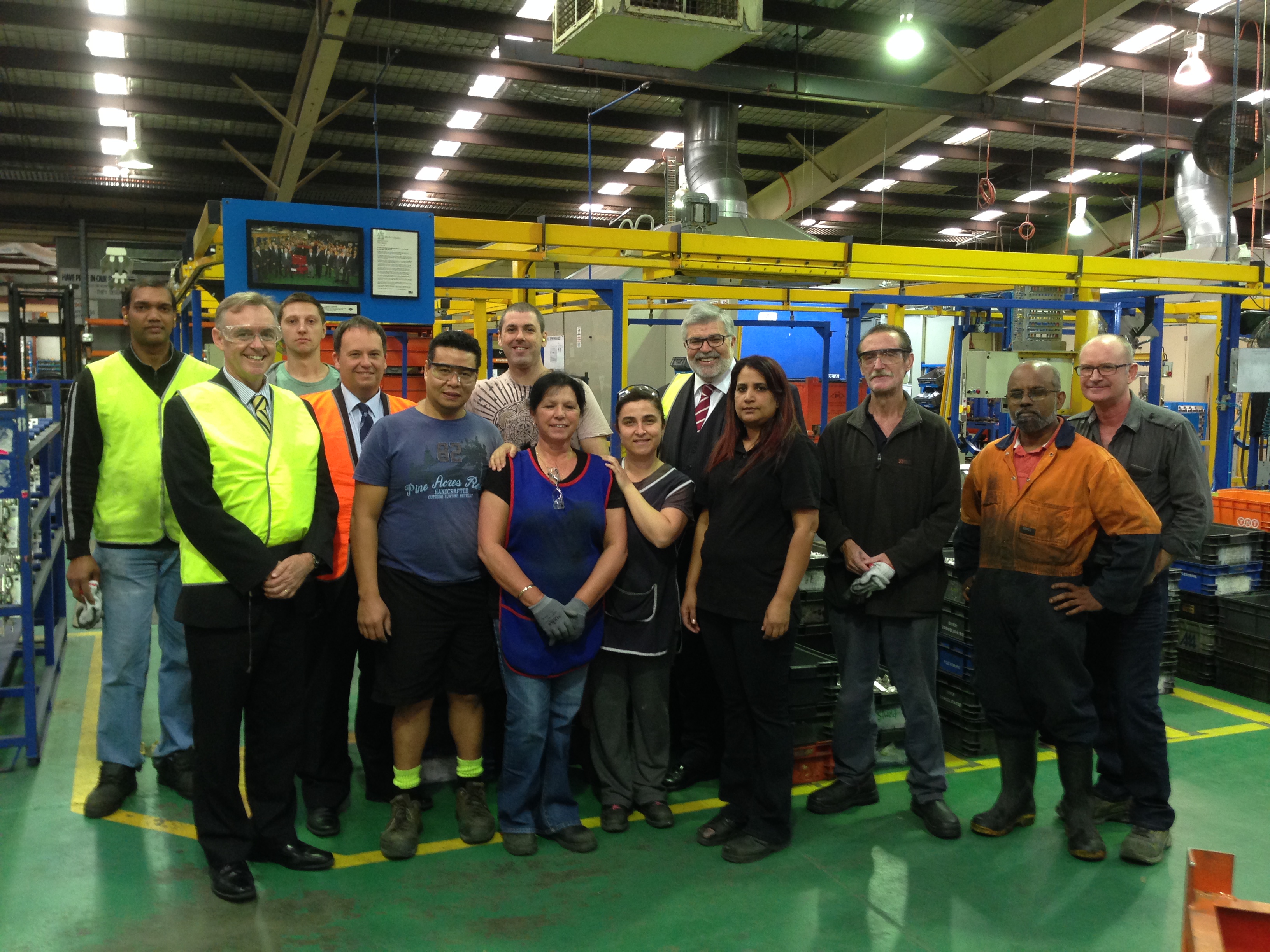 \x3cp\x3eSenators Chris Ketter [Chair] and Kim Carr with staff of automotive component manufacturer Consolidated Industries, Reservoir, Vic, 10 March 2015.\x3c/p\x3e