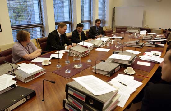 \x3cp\x3eStanding Committee on Regulations and Ordinances in session ahead of the tabling of its 112th report, 23 June 2005. L-R: Janice Paull [Research Officer], James Warmenhoven [Secretary], Senator Tsebin Tchen [Chair] and Professor Stephen Bottomley [Legal Adviser]. DPS Auspic. \x3c/p\x3e